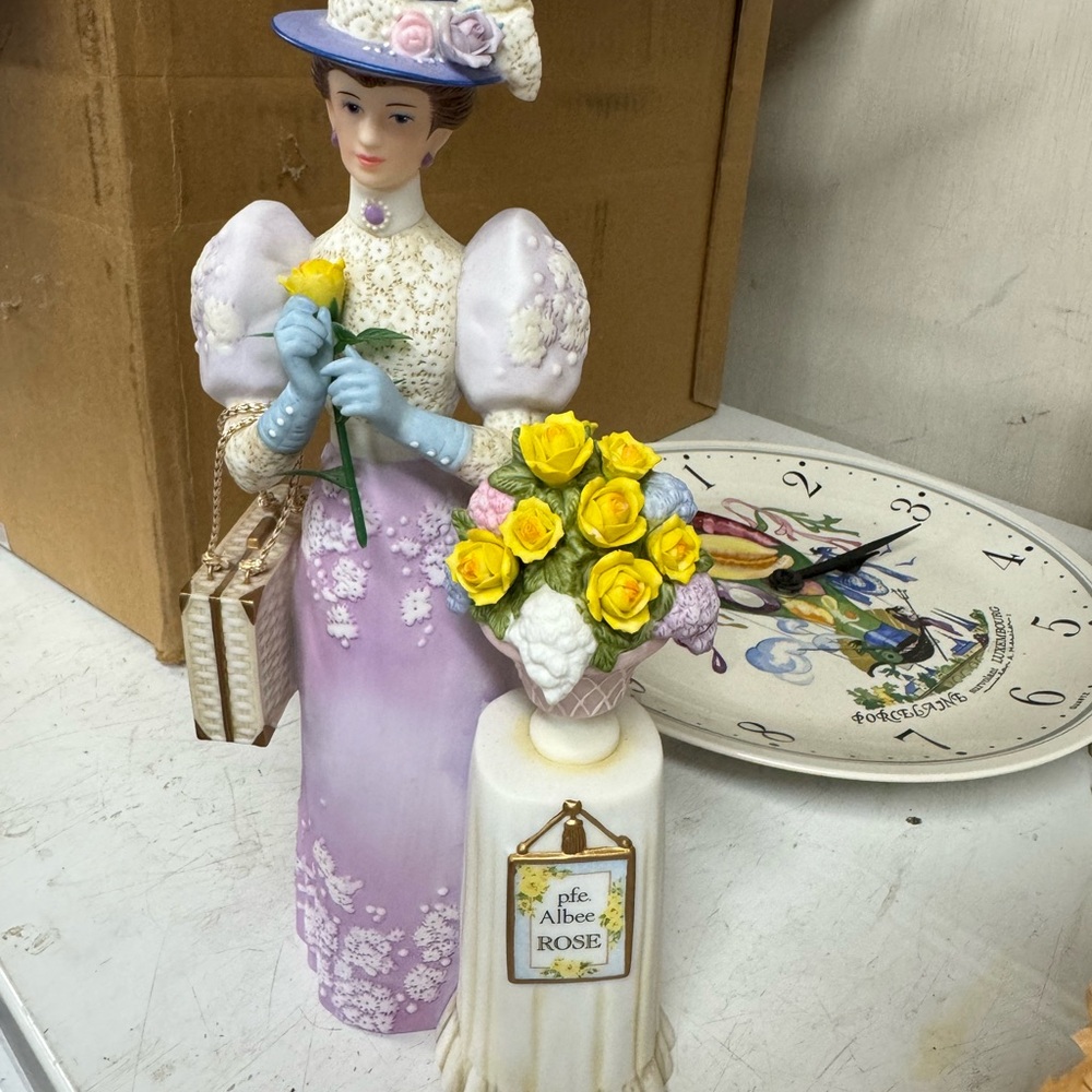 Avon Lady Figurine with Lavender Dress and Yellow Roses